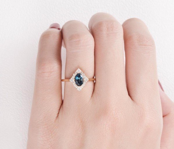 Oval Blue Topaz Vintage Halo Ring - Finger