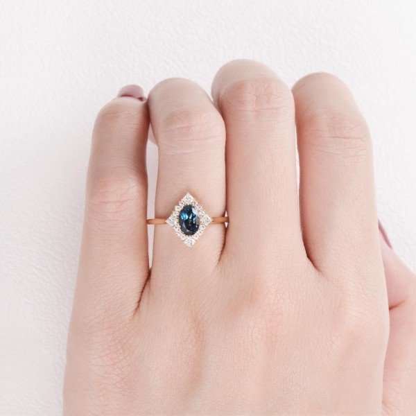 Oval Blue Topaz Vintage Halo Ring - Finger