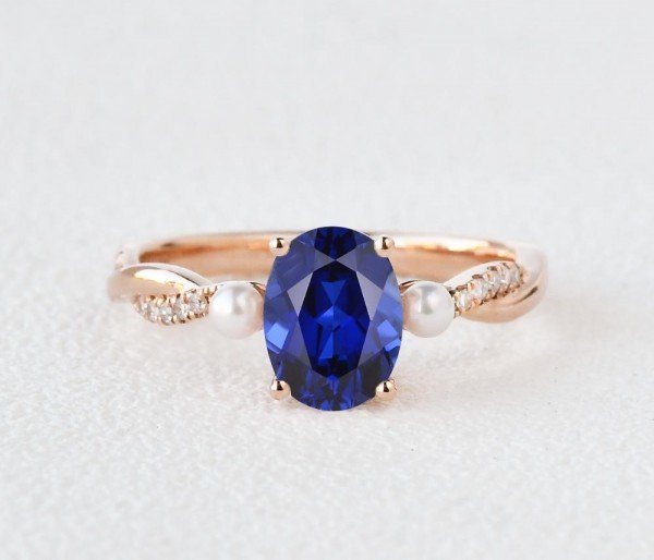 Oval Shaped Sapphire Trinity Twist Ring - Front