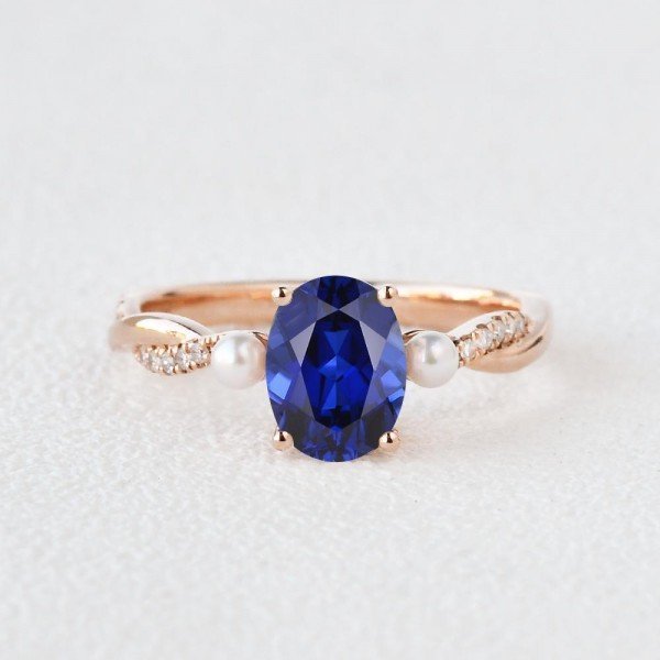 Oval Shaped Sapphire Trinity Twist Ring - Front