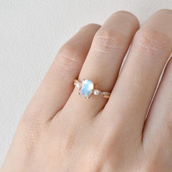 Oval Shaped Moonstone Trinity Twist Ring - Finger